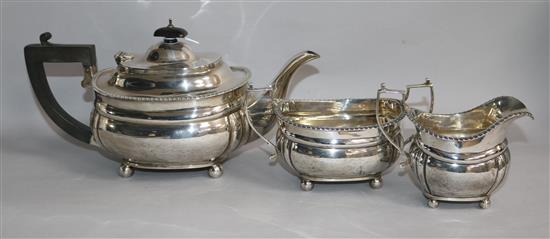 A George V silver three piece tea set, Harrods Ltd, London, 1929,
